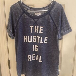 Like new “The Hustle is Real” tee